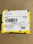 Atlas Copco 0654.0118 Valve Seat. New In Box. Fixed Price $75.00.