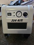 Jun-air 1770008 Oilless Piston Air Compressor W Dryer & Sound Proof Cabinet 120v. Fixed Price $2500.00.