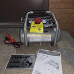 Husky 2 Gal. 135 Psi Portable Electric Oil-free Quiet Air Compressor W/ Gauges. Fixed Price $192.20.